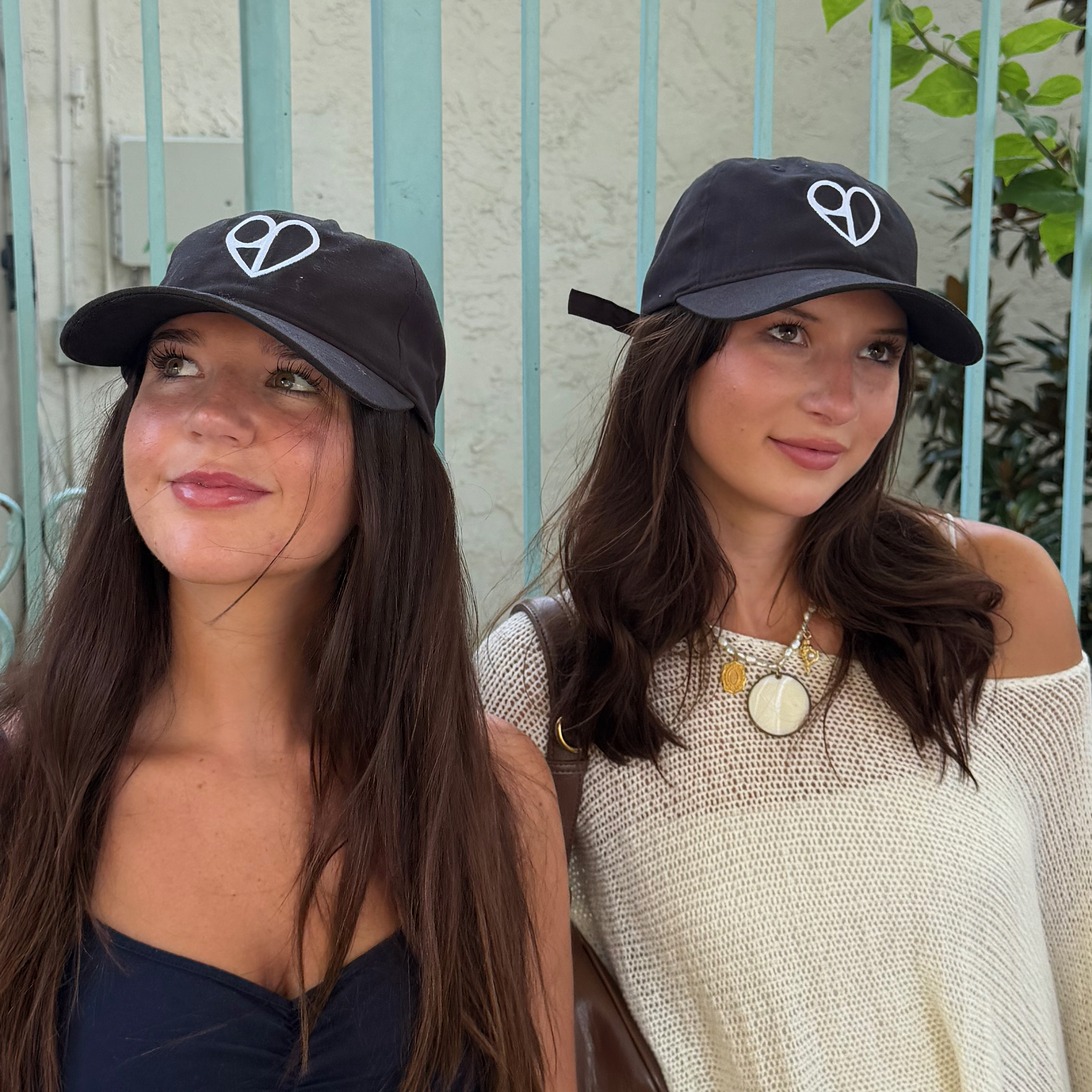 Close-up of embroidered BDGL logo on hat